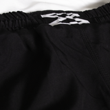 Close-up of Fundamental grappling shorts - reinforced stitching and 4-way stretch fabric detail
